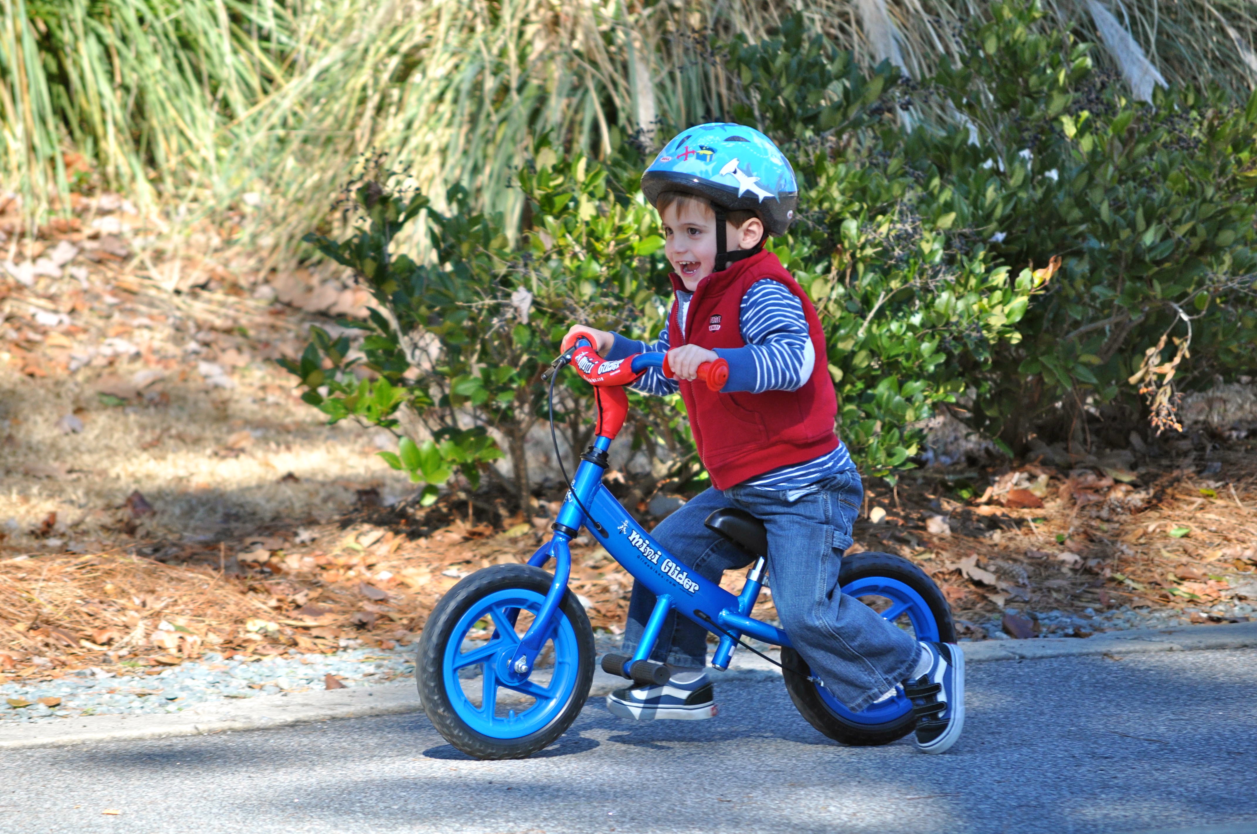 boy on mini glider bike